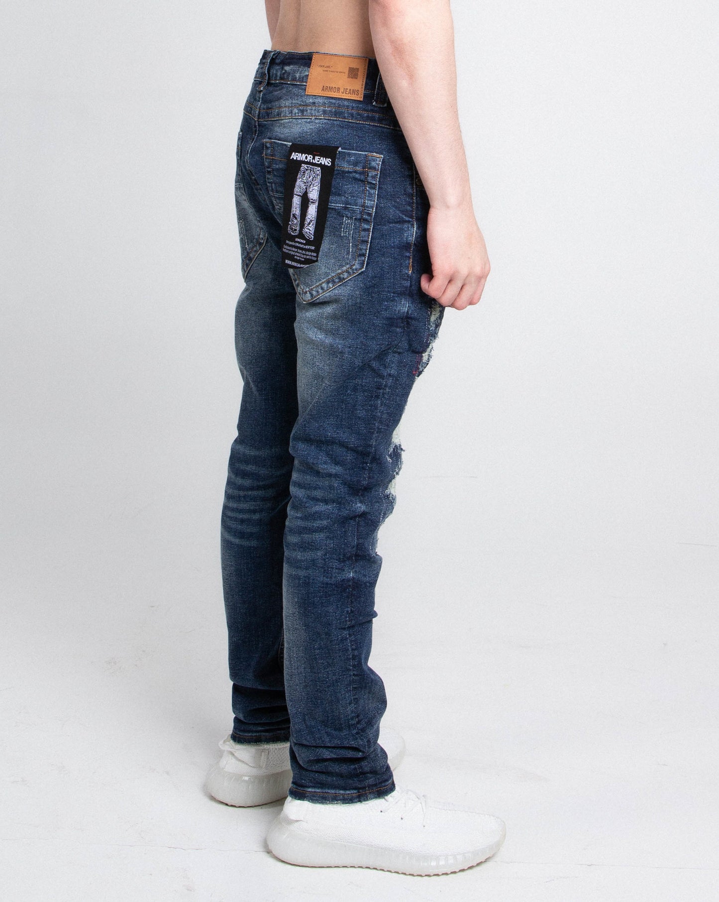 A403 SMALL RIPPED MID-RISE SKINNY JEANS